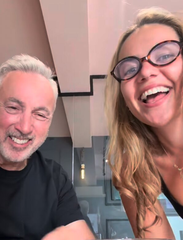 Tony, Director of Home Estate Agents, laughing with Lucy from Social It
